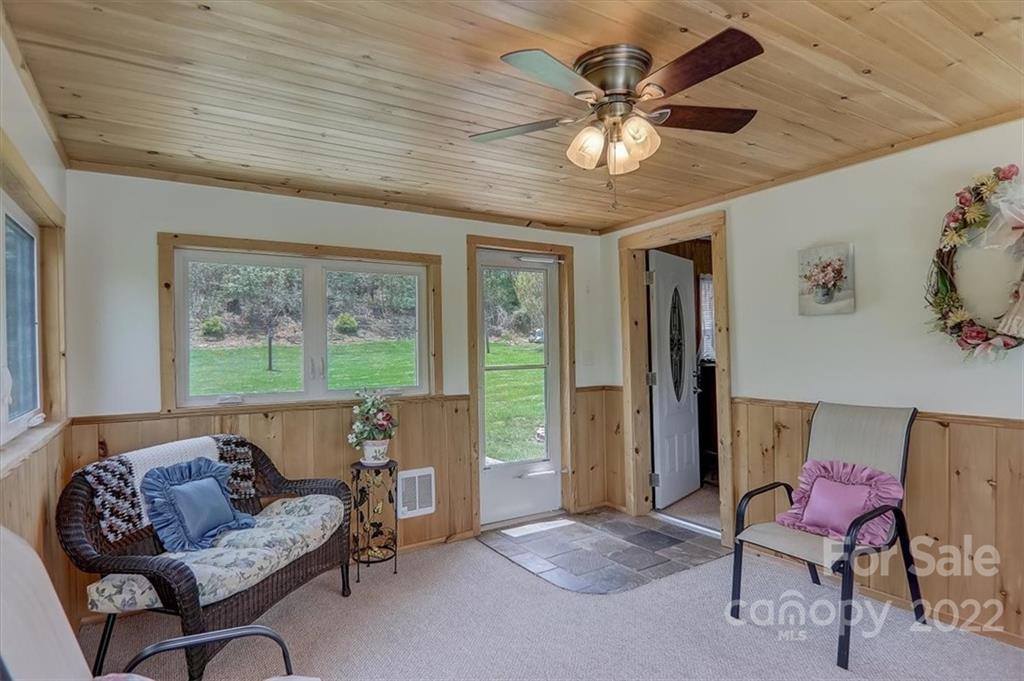 115 Substation Road Canton, NC 28716 - Photo 23 of 41 a living room with furniture and a large window