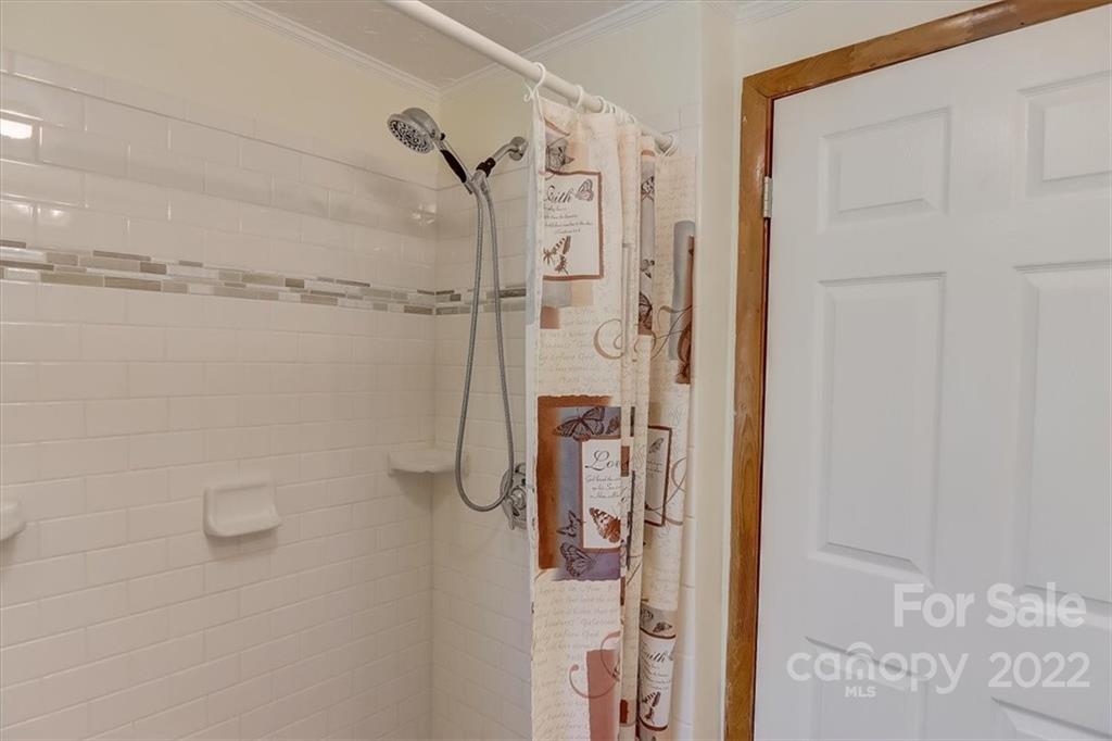 115 Substation Road Canton, NC 28716 - Photo 28 of 41 a bathroom with a shower