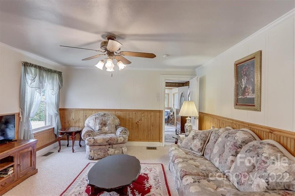 115 Substation Road Canton, NC 28716 - Photo 33 of 41 a living room with furniture and a large window