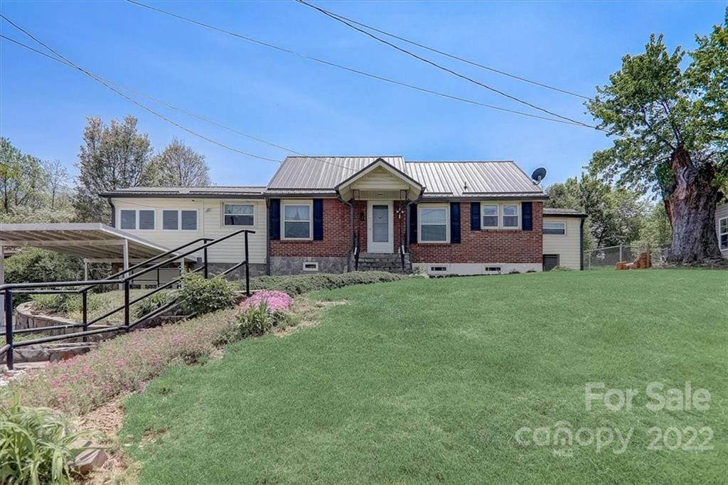115 Substation Road Canton, NC 28716 - Photo 35 of 41 front view of a house with a yard