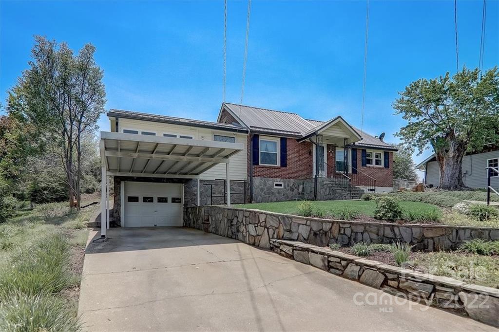 115 Substation Road Canton, NC 28716 - Photo 39 of 41 a front view of a house with a yard