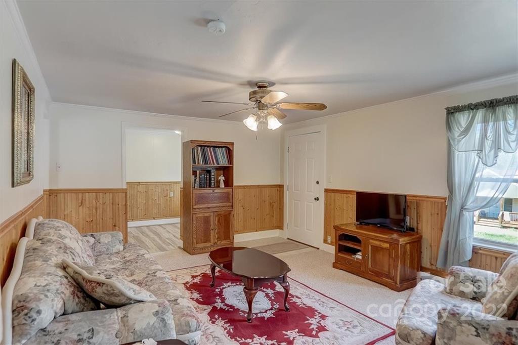115 Substation Road Canton, NC 28716 - Photo 5 of 41 a living room with furniture and a flat screen tv