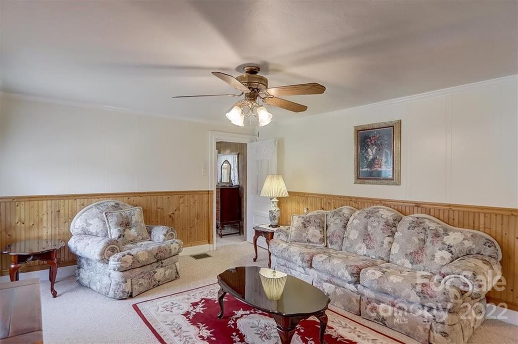 115 Substation Road Canton, NC 28716 - Photo 7 of 41 a living room with furniture and a couch