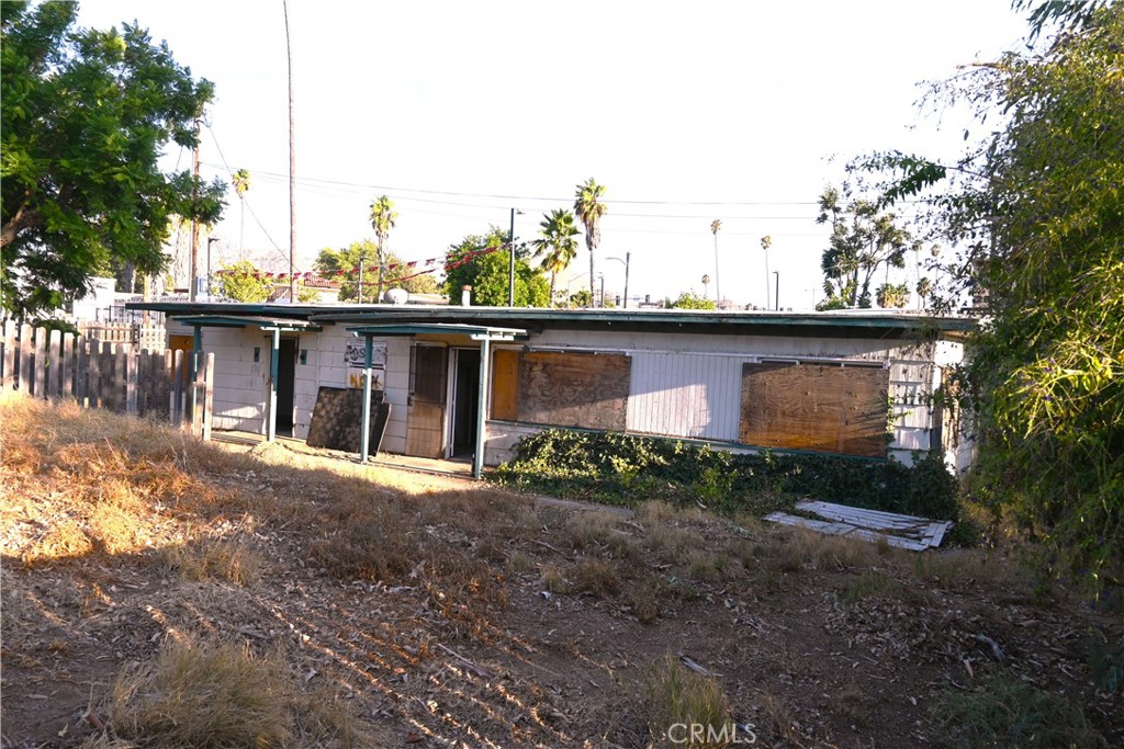 217 Iowa Avenue Riverside, CA 92507 - Photo 16 of 16 a view of a house next to a yard