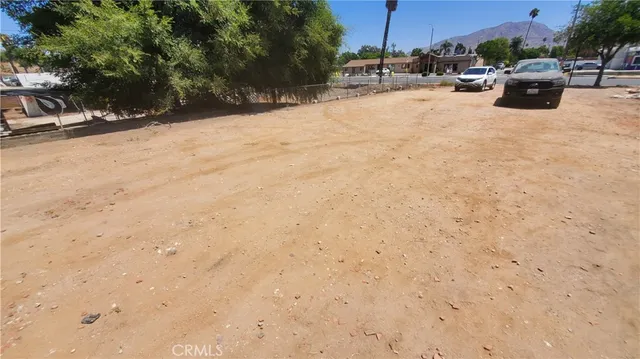 a view of a backyard of the house