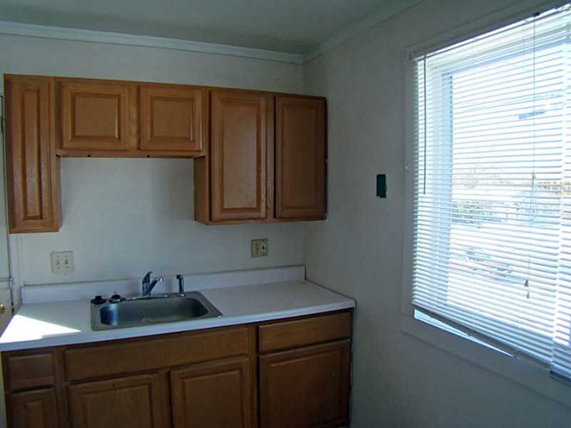 11 Ludlow Road Middletown, RI 02842 - Photo 5 of 24 Kitchen. 1 BR Unit kitchen has nice light from large window.