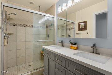 10 Rio Via Oak View, CA 93022 - Photo 4 of 19 a bathroom with a sink mirror and shower