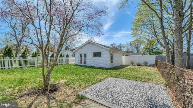a house with a tree in front of it