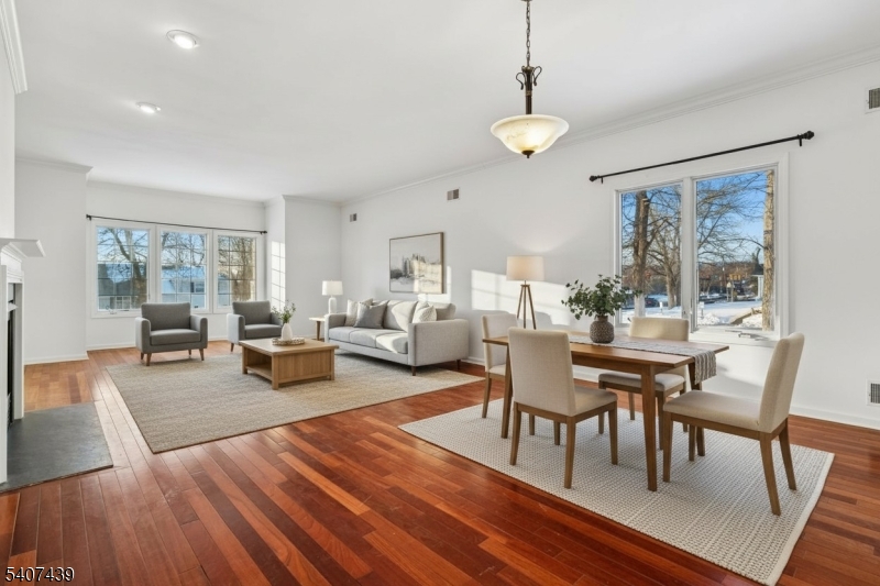 282 South Street, Unit B New Providence, NJ 07974 - Photo 5 of 28 a view of a dining room with furniture window and wooden floor