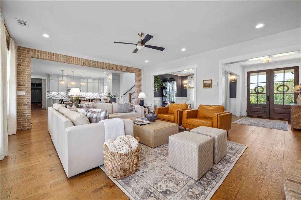 815 North Hampton Way Monroe, GA 30656 - Photo 13 of 89 a living room with furniture and a wooden floor