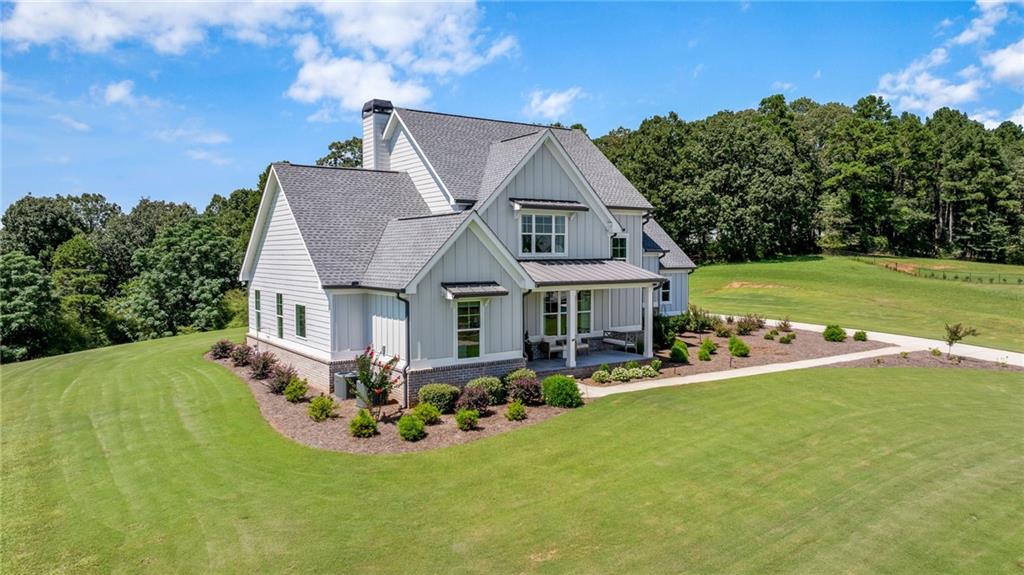 815 North Hampton Way Monroe, GA 30656 - Photo 2 of 89 a front view of house with yard and green space