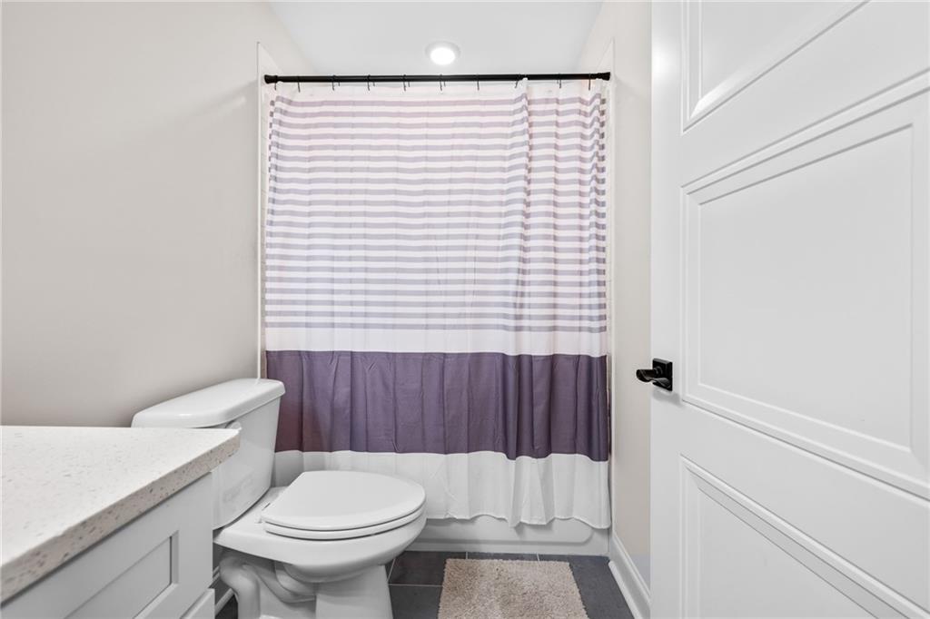 815 North Hampton Way Monroe, GA 30656 - Photo 37 of 89 a white toilet sitting next to a small bathroom