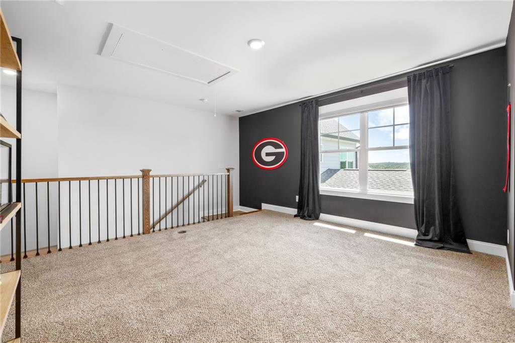 815 North Hampton Way Monroe, GA 30656 - Photo 46 of 89 an empty room with windows