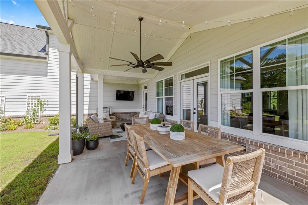 815 North Hampton Way Monroe, GA 30656 - Photo 54 of 89 a view of a dining room with furniture window and outside view