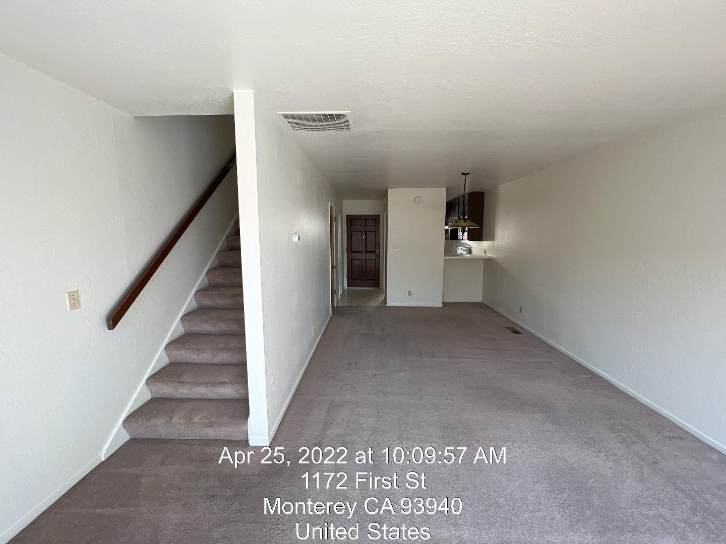 1172 First Street Monterey, CA 93940 - Photo 30 of 31 a view of a hallway with staircase