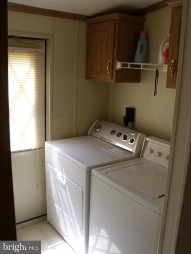 10505 Cedarville Road, Unit 1015 Brandywine, MD 20613 - Photo 11 of 26 a utility room with dryer and washer