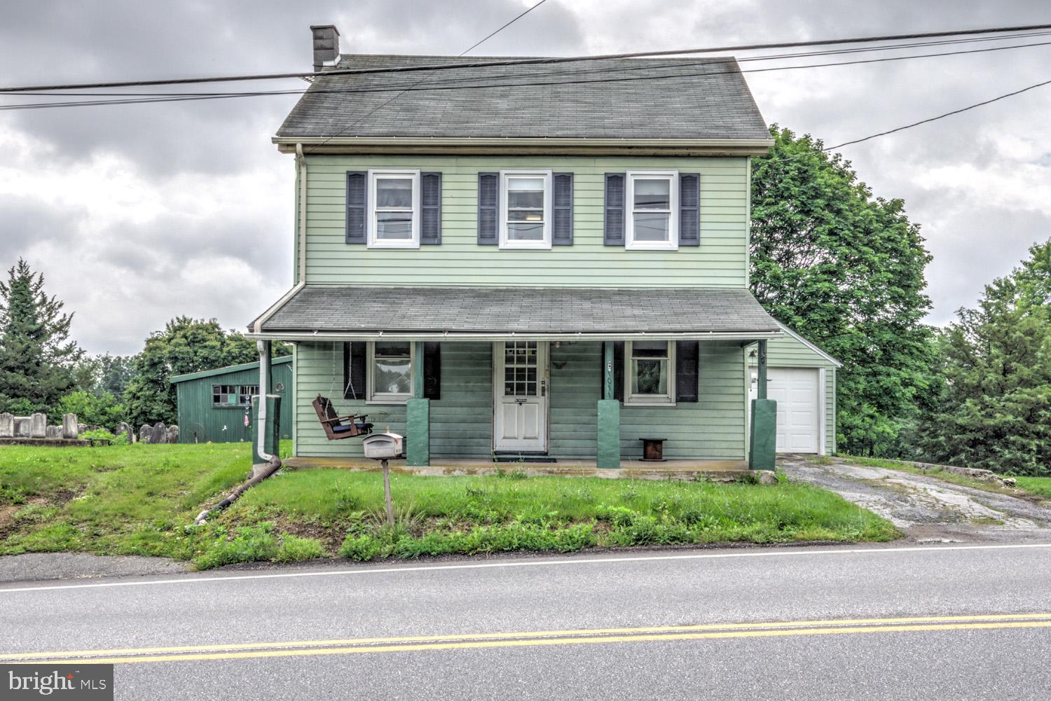 1011 Mount Joy Road Manheim, PA 17545 - Photo 1 of 33 a front view of a house with a yard