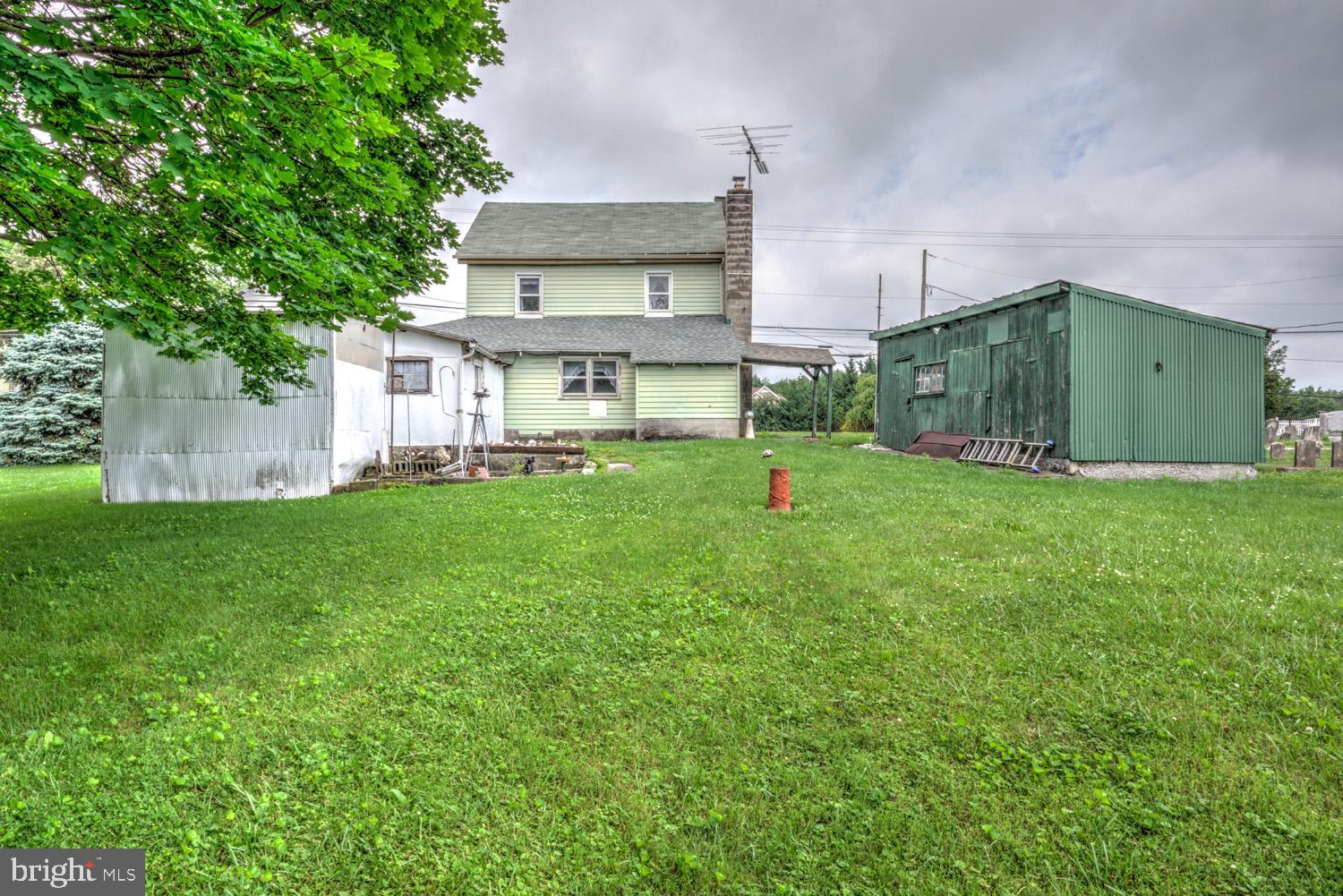 1011 Mount Joy Road Manheim, PA 17545 - Photo 7 of 33 a view of a house with a big yard and large trees