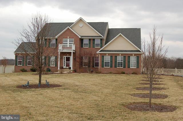 264 Rudder Road Shepherdstown, WV 25443 - Photo 1 of 30 a front view of a house with a yard