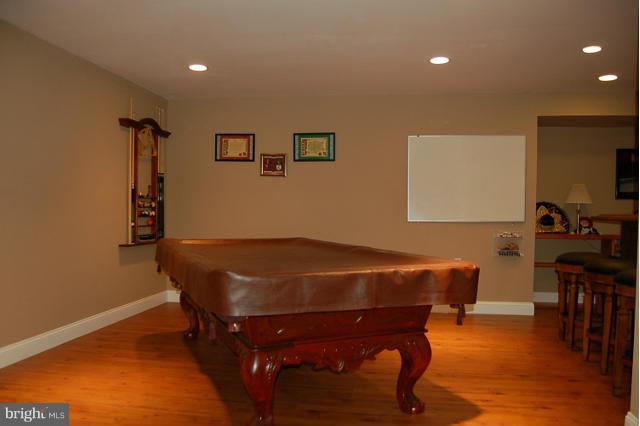 264 Rudder Road Shepherdstown, WV 25443 - Photo 17 of 30 a room with furniture and wooden floor