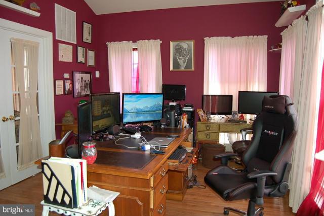 264 Rudder Road Shepherdstown, WV 25443 - Photo 9 of 30 a view of a workspace with furniture and a window