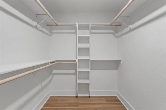 a view of an empty walk in closet