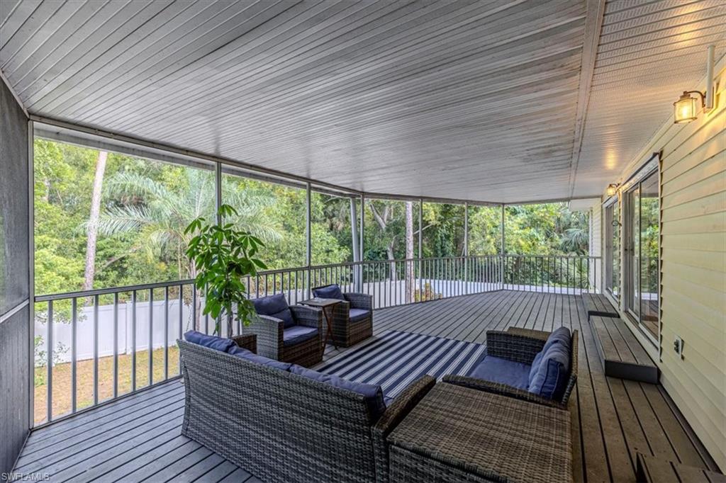 3618 Cottage Club Lane Naples, FL 34105 - Photo 20 of 26 a view of a two chairs in the deck