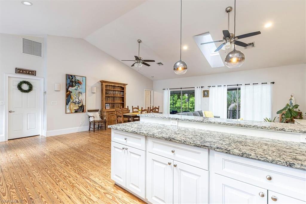 3618 Cottage Club Lane Naples, FL 34105 - Photo 6 of 26 a view of a kitchen counter space a sink and dishwasher