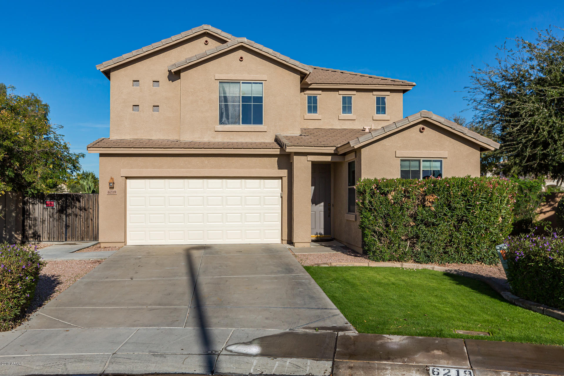 6219 South Martingale Road Gilbert, AZ 85298 - Photo 1 of 34 1) FRONT OF HOME