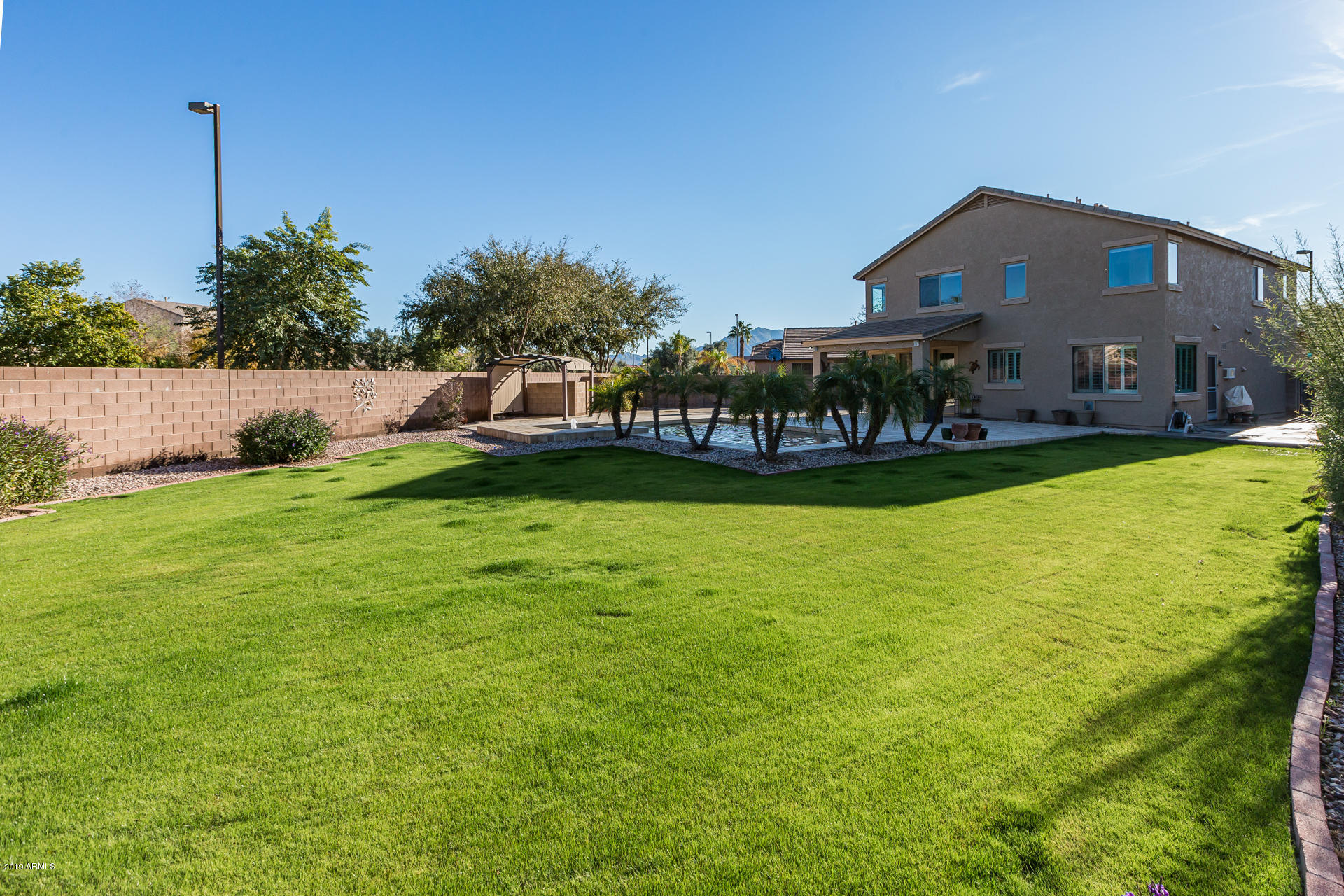 6219 South Martingale Road Gilbert, AZ 85298 - Photo 22 of 34 23) BACK OF HOME