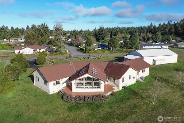 an aerial view of a house with a garden