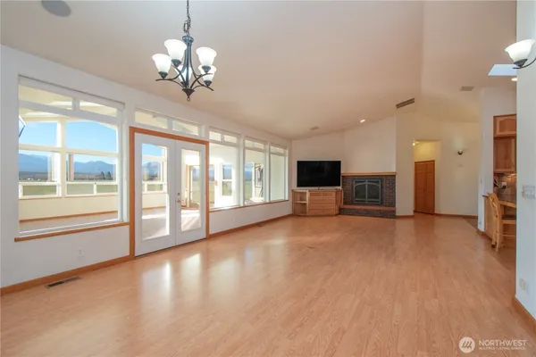 a view of livingroom with furniture wooden floor and window