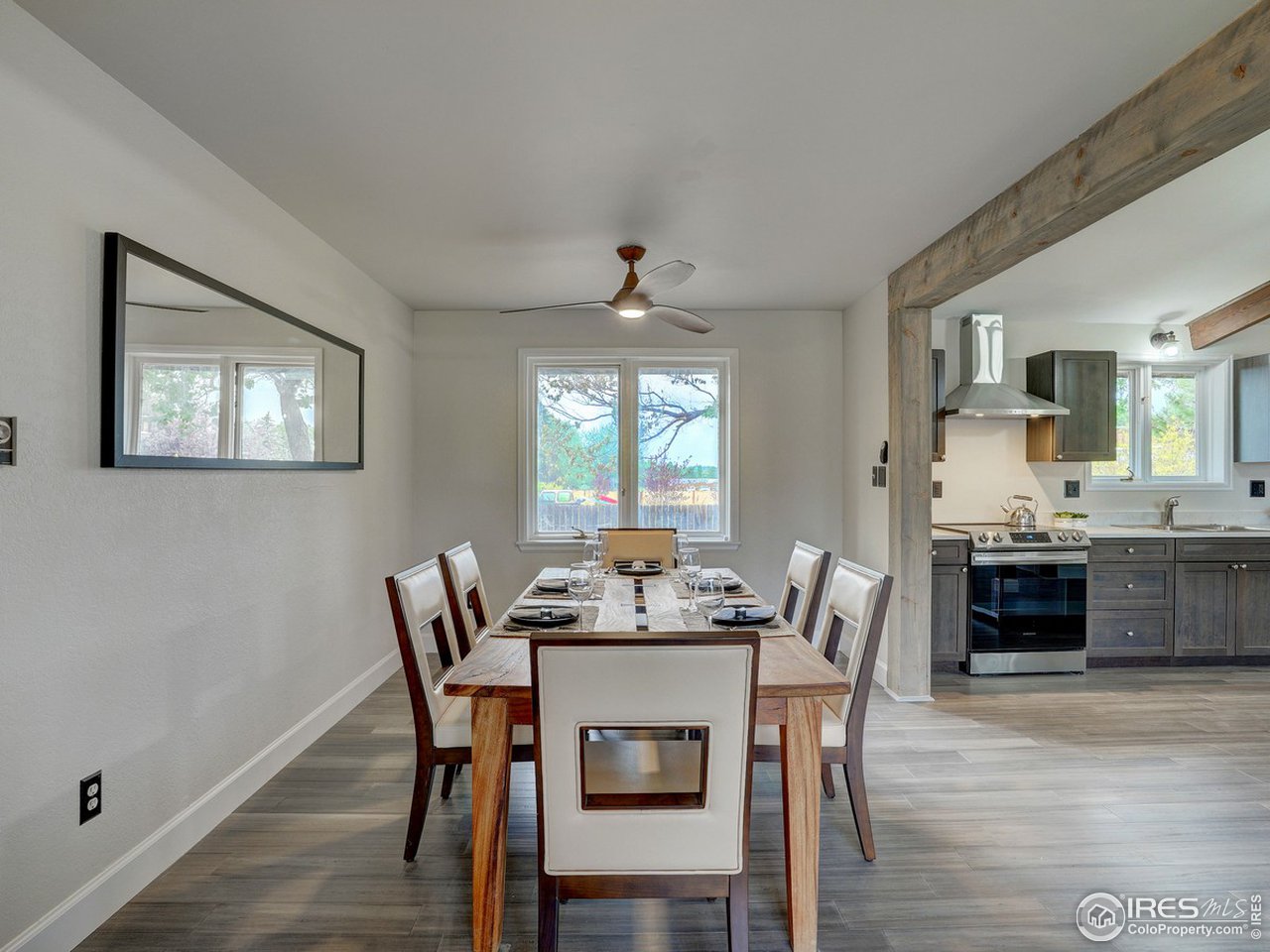 7823 Hygiene Road Longmont, CO 80503 - Photo 8 of 21 a dining room with furniture and window