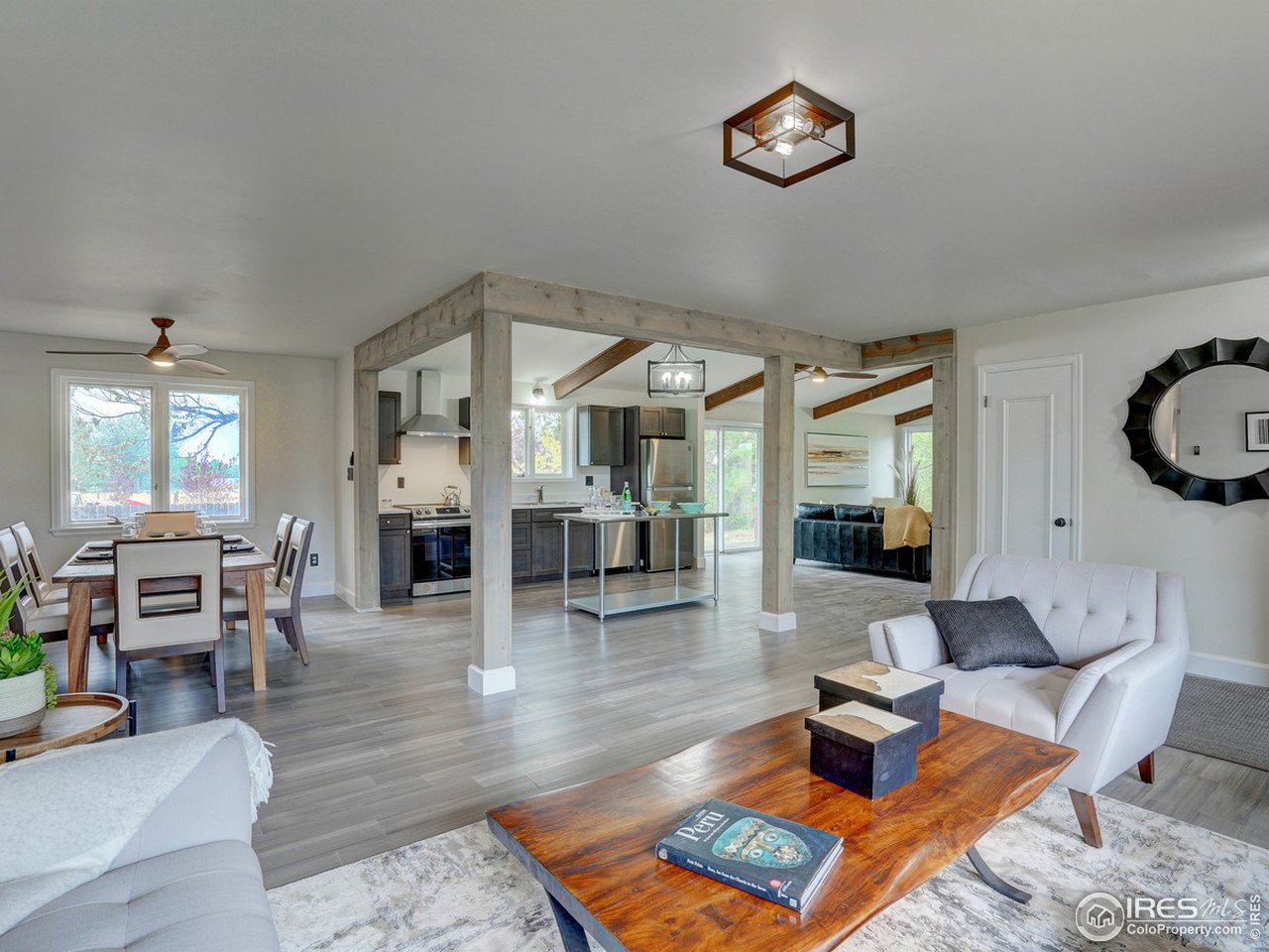 7823 Hygiene Road Longmont, CO 80503 - Photo 9 of 21 a living room with furniture and wooden floor