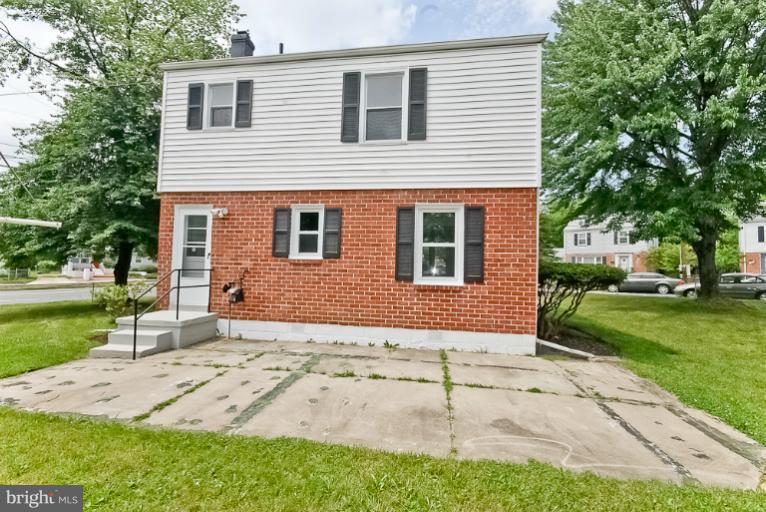 6600 Riggs Road Hyattsville, MD 20783 - Photo 11 of 24 a front view of a house with garden