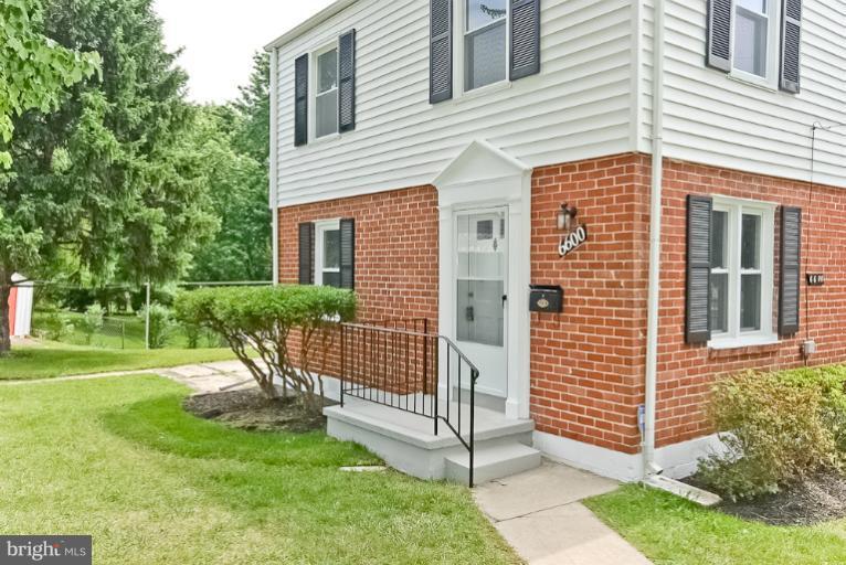 6600 Riggs Road Hyattsville, MD 20783 - Photo 19 of 24 a view of a house with backyard and a garden