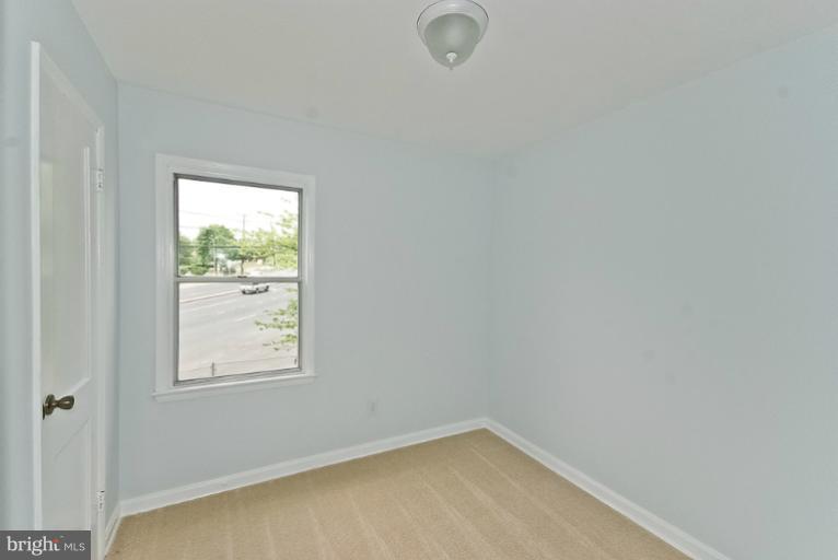 6600 Riggs Road Hyattsville, MD 20783 - Photo 22 of 24 an empty room with a window
