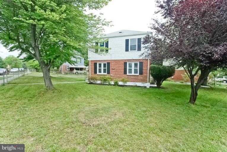 6600 Riggs Road Hyattsville, MD 20783 - Photo 24 of 24 a front view of house with yard and green space