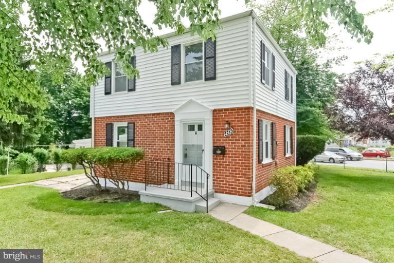 6600 Riggs Road Hyattsville, MD 20783 - Photo 8 of 24 a view of a house with a yard and sitting area