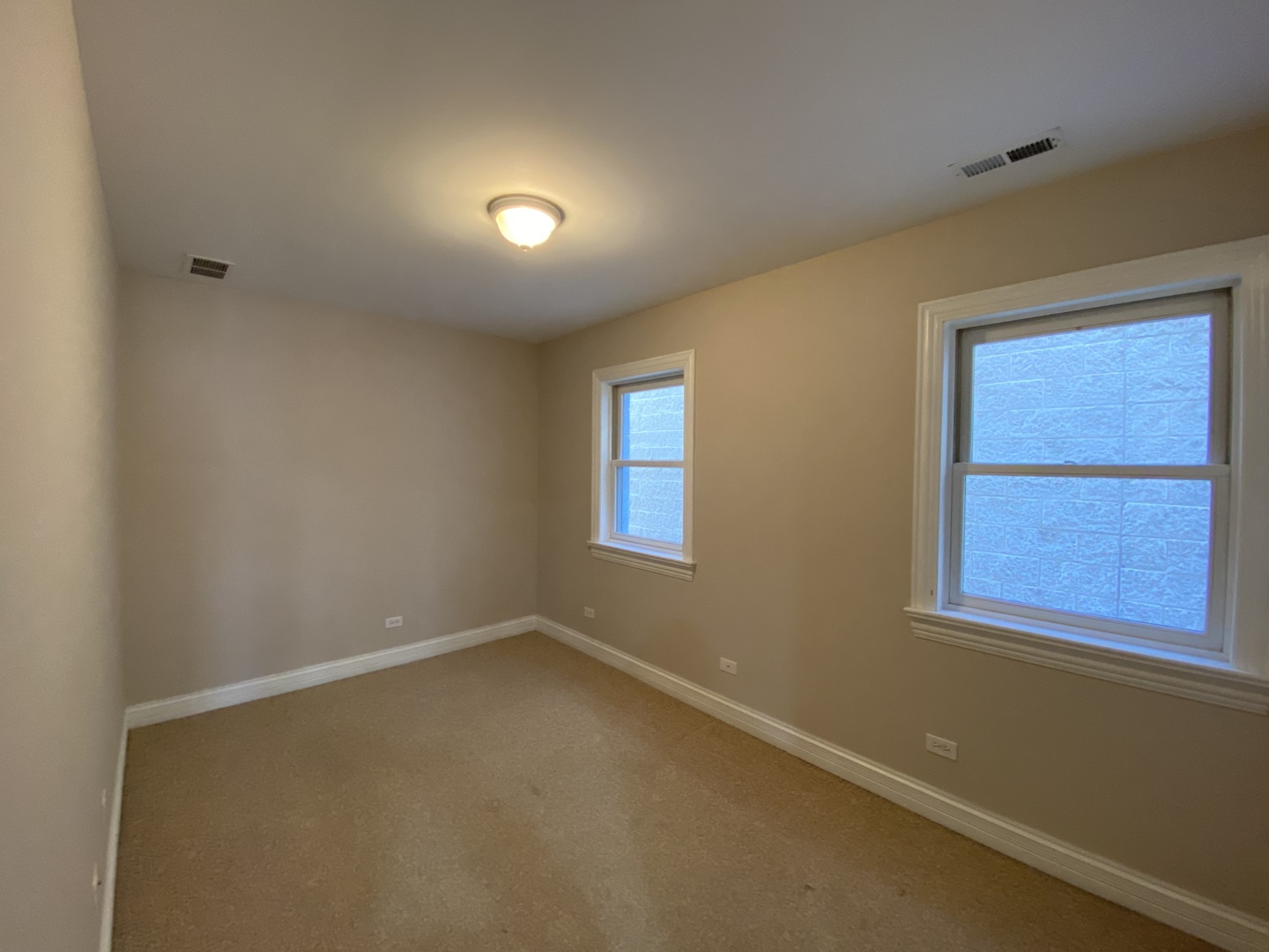 2525 West Harrison Street, Unit 2 Chicago, IL 60612 - Photo 11 of 16 an empty room with a window