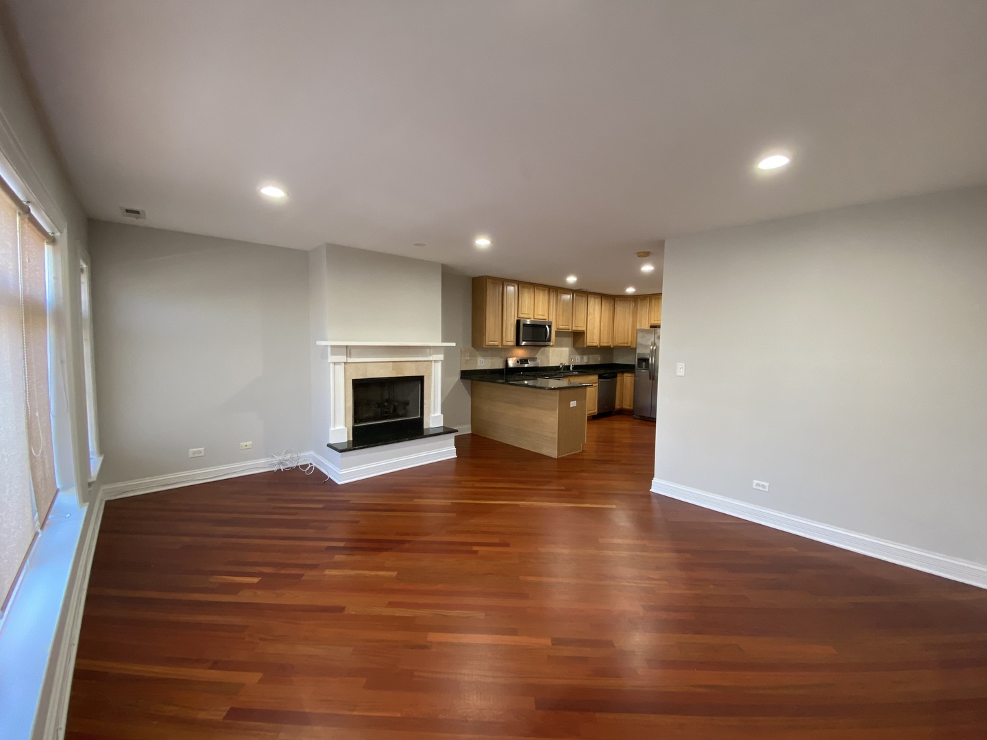 2525 West Harrison Street, Unit 2 Chicago, IL 60612 - Photo 3 of 16 a view of a kitchen with a sink and a stove top oven