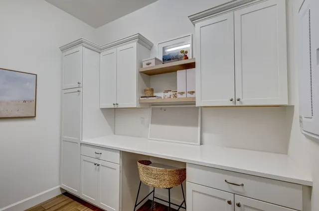 a hallway with cabinets