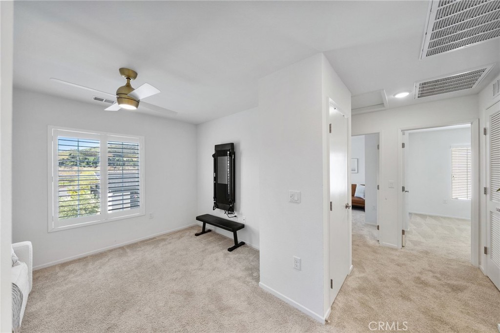 303 Sweet Place Fallbrook, CA 92028 - Photo 15 of 59 a view of a livingroom with a window and a couch