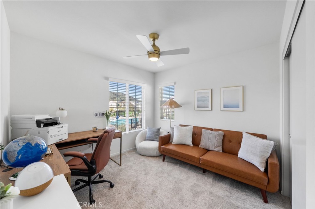 303 Sweet Place Fallbrook, CA 92028 - Photo 19 of 59 a living room with furniture and a window