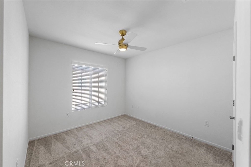 303 Sweet Place Fallbrook, CA 92028 - Photo 23 of 59 a view of an empty room with a window