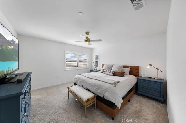 a bathroom with a double vanity sink and mirror
