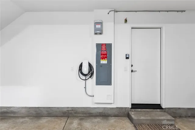 a view of a house with a street