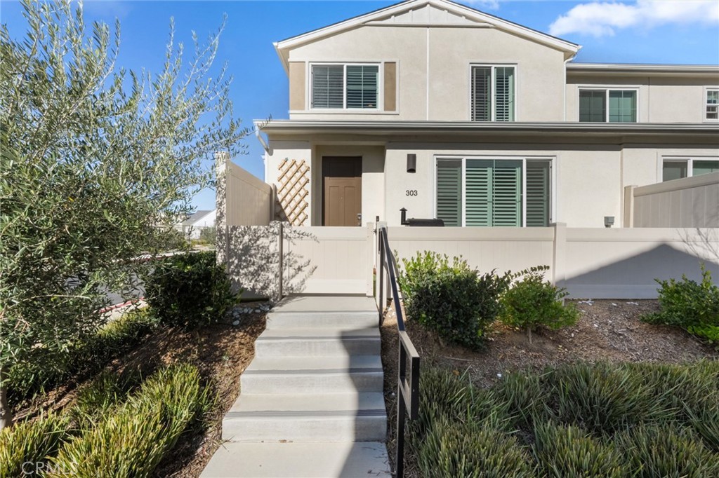 303 Sweet Place Fallbrook, CA 92028 - Photo 32 of 59 a front view of a house with a yard