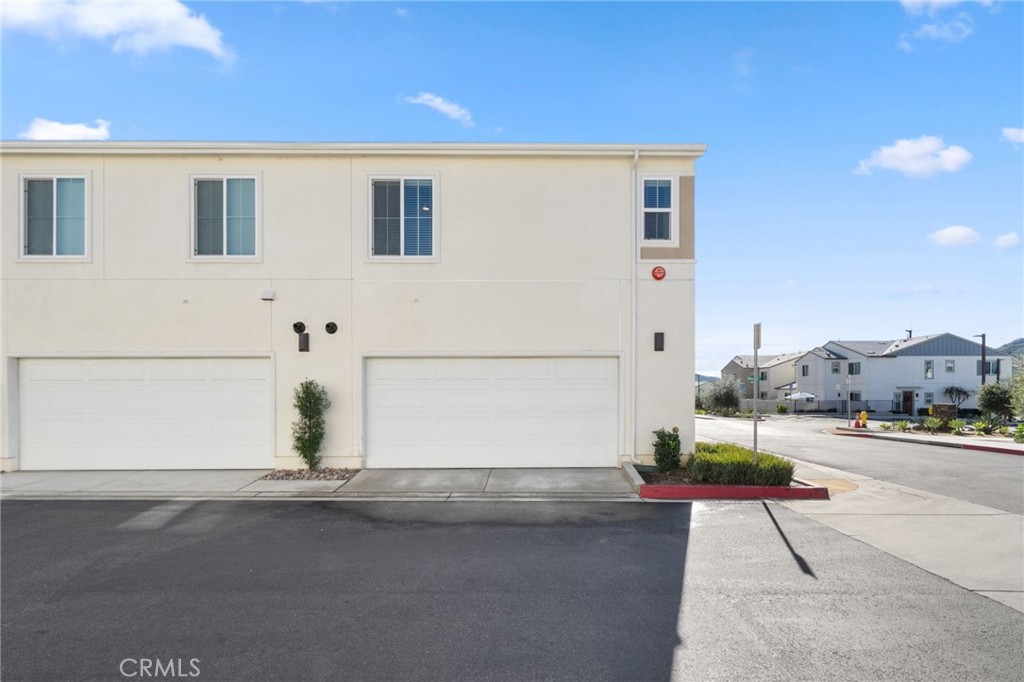 303 Sweet Place Fallbrook, CA 92028 - Photo 35 of 59 a view of a house with a street