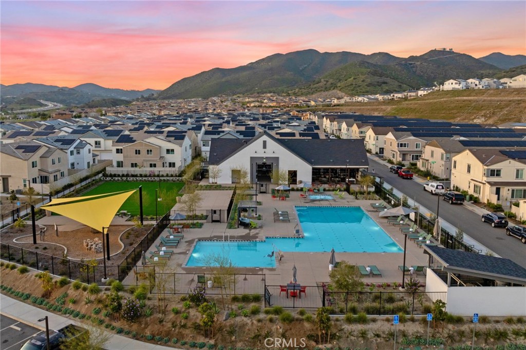 303 Sweet Place Fallbrook, CA 92028 - Photo 38 of 59 a view of a houses with a lake and a mountain view